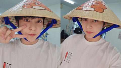 Vừa đến Việt Nam, Xiumin (EXO) đã khoe visual "cưng xỉu" trong chiếc nón lá fan tặng!