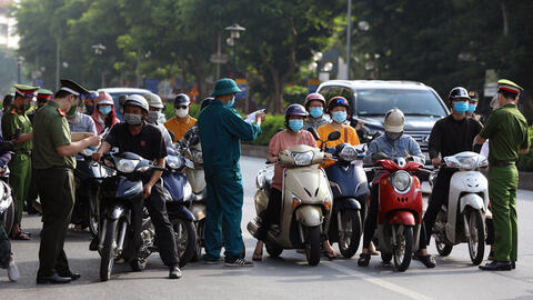 Hà Nội tiếp tục sử dụng giấy đi đường theo mẫu cũ