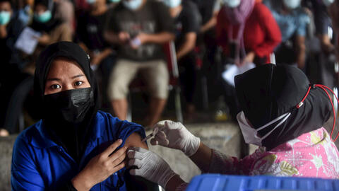 Châu Á cần kiểm soát tốt dịch COVID-19 trước khi Fed tăng lãi suất