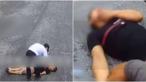 Ông bố nằm dài giữa đường vì bất lực khi con làm sai bài toán