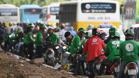 Grab, Go-Viet tăng bao nhiêu tiền phụ phí đặt xe dịp Tết?