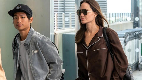 Angelina Jolie mặc đồ ngủ 1.900 USD ra sân bay