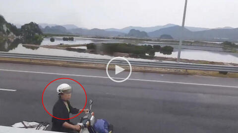 Người phụ nữ bất chấp nguy hiểm đi ngược đường trên cao tốc Hà Nội – Hạ Long