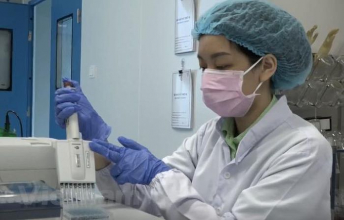   Nghiên cứu vắcxin NANO COVAX tại Nanogen(Ảnh: P.V/Vietnam+)  