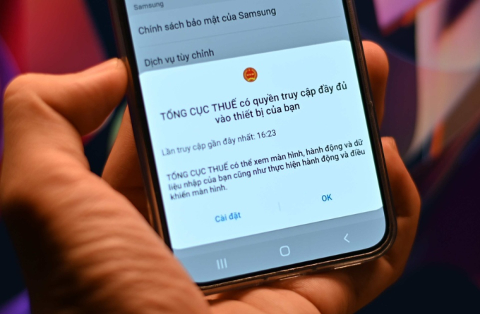 App giả mạo Cục Thuế yêu cầu nhiều quyền bất thường trên di động người dùng. Ảnh: Xuân Sang.