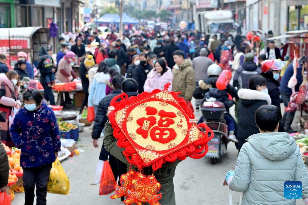 Người Trung Quốc háo hức đón Tết Nguyên đán sau 3 năm phong tỏa vì COVID-19 - Ảnh 2.