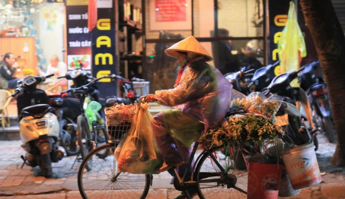 Phía Đông Bắc Bộ và Thủ đô Hà Nội sáng và đêm có mưa nhỏ rải rác, trời rét hại. (Ảnh: Hoàng Hiếu/TTXVN)