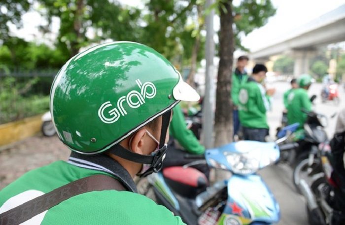 Dịch vụ  kinh doanh gọi xe  của grab gặp bất lợi vì COVID-19. Ảnh: Internet