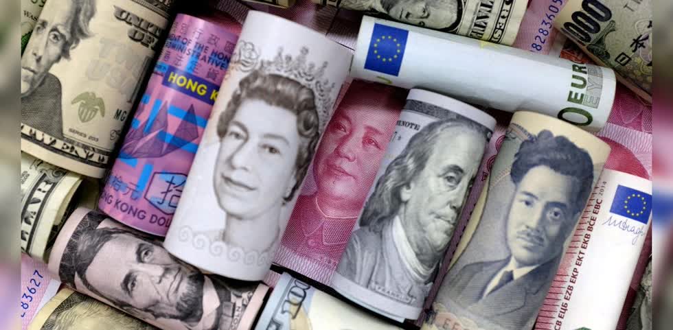 USD vẫn là đồng tiền mạnh mà euro và nhân dân tệ chưa thể cạnh tranh. Ảnh: Reuters